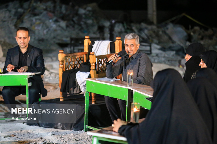 محفل شعر امین در مدرسه بمباران شده‌ میناب