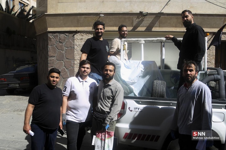 کارگاه مردمی جهادی شیشه بری در ساختمان‌های آسیب دیده